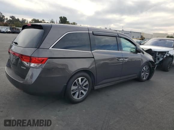 ✅ 2016 Honda Odyssey Touring Elite • VIN: 5FNRL5H90GB040623 • Lot: 92664135. Listed on Copart with 126,235 mi. Free auction sales archive from the USA and detailed vehicle history report at DreamBid. Image 3.