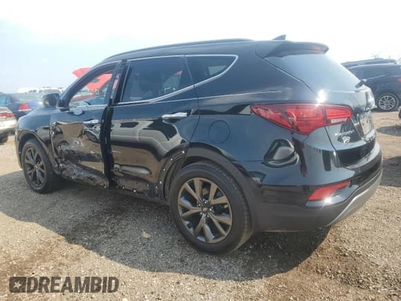 ✅ 2017 Hyundai Santa Fe Ultimate • VIN: 5NMZWDLA0HH042942 • Лот: 62794374. Опубликован ранее на Copart с пробегом 73 424 миль. Бесплатный доступ к архиву аукционных продаж из США и подробный отчёт об истории автомобиля на DreamBid. Изображение 2.