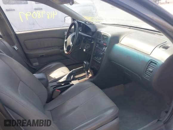 ✅ 1999 Infiniti I30 • VIN: JNKCA21A1XT775699 • Lot: 41898097. Listed on IAAI with 183,753 mi. Free auction sales archive from the USA and detailed vehicle history report at DreamBid. Image 5.