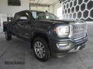 ✅ 2017 GMC Sierra 1500 Denali • VIN: 3GTU2PEJ2HG410828 • Lot: 50067345. Wystawiony na Copart z przebiegiem 124 361 mil. Bezpłatny archiwum sprzedaży aukcyjnych z USA i szczegółowy raport historii pojazdu na DreamBid. Zdjęcie 1.