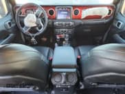 ✅ 2021 Jeep Wrangler Unlimited Rubicon • VIN: 1C4HJXFGXMW568482 • Lot: 92701725. Listed on Copart with 9,523 mi. Free auction sales archive from the USA and detailed vehicle history report at DreamBid. Image 8.