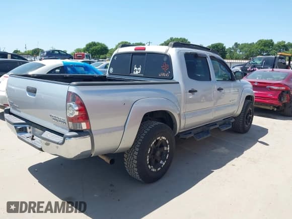 ✅ 2010 Toyota Tacoma PreRunner • VIN: 3TMJU4GN3AM098103 • Lot: 41981209. Listed on IAAI with 218,329 mi. Free auction sales archive from the USA and detailed vehicle history report at DreamBid. Image 4.
