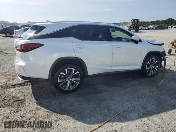 ✅ 2021 Lexus RX 350L • VIN: JTJHZKFA6M2028946 • Lot: 61445525. Listed on Copart with 60,641 mi. Free auction sales archive from the USA and detailed vehicle history report at DreamBid. Image 3.