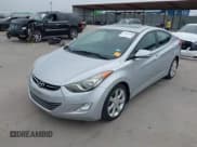 ✅ 2013 Hyundai Elantra GLS • VIN: 5NPDH4AE7DH268063 • Lot: 42269526. Listed on IAAI with 123,067 mi. Free auction sales archive from the USA and detailed vehicle history report at DreamBid. Image 2.