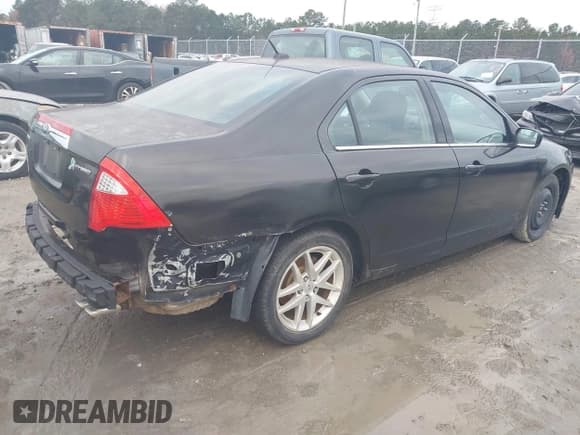 ✅ 2012 Ford Fusion Hybrid • VIN: 3FADP0L32CR157817 • Lot: 43842344. Listed on IAAI with 142,555 mi. Free auction sales archive from the USA and detailed vehicle history report at DreamBid. Image 4.