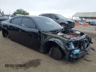 2022 Dodge Charger SRT Hellcat Widebody z VIN 2C3CDXL97NH140946, wystawiony jako IAAI lot #42569883 z przebiegiem 58 281 mil mil oraz . Historia ofert i sprzedaży dostępna na DreamBid. Obrazek 1.