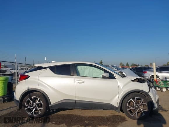 ✅ 2018 Toyota C-HR XLE • VIN: NMTKHMBX1JR052009 • Лот: 43584600. Опубликован ранее на IAAI с пробегом 88 065 миль. Бесплатный доступ к архиву аукционных продаж из США и подробный отчёт об истории автомобиля на DreamBid. Изображение 13.