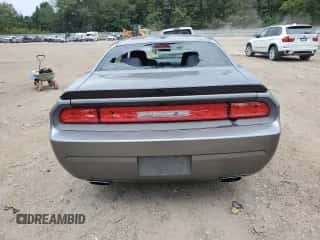 2012 Dodge Challenger R/T z VIN 2C3CDYBT1CH201725, wystawiony jako Copart lot #69679104 z przebiegiem 174 416 mil mil oraz Szkoda całkowita • Salvage title. Historia ofert i sprzedaży dostępna na DreamBid. Obrazek 6.