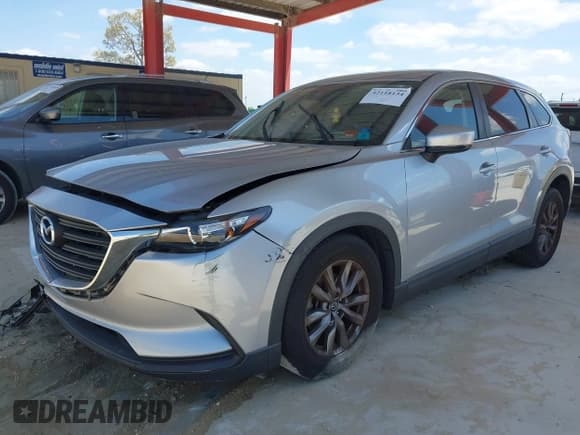 ✅ 2018 Mazda CX-9 Sport • VIN: JM3TCABYXJ0230442 • Лот: 42118134. Опубликован ранее на IAAI с пробегом 81 800 миль. Бесплатный доступ к архиву аукционных продаж из США и подробный отчёт об истории автомобиля на DreamBid. Изображение 18.