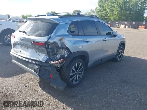 ✅ 2023 Toyota Corolla Cross XLE • VIN: 7MUDAABG7PV077220 • Lot: 43137122. Listed on IAAI with 37,620 mi. Free auction sales archive from the USA and detailed vehicle history report at DreamBid. Image 4.