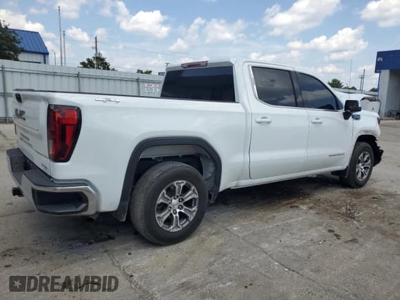 ✅ 2023 GMC Sierra 1500 SLE • VIN: 1GTUUBED6PZ181172 • Лот: 91399105. Опубликован ранее на Copart с пробегом 56 212 миль. Бесплатный доступ к архиву аукционных продаж из США и подробный отчёт об истории автомобиля на DreamBid. Изображение 3.