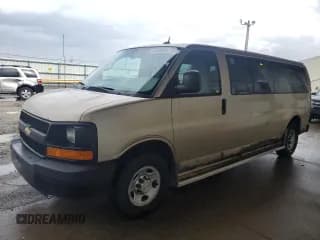 ✅ 2012 Chevrolet Express Passenger 1LS • VIN: 1GAZGZFA1C1125149 • Lot: 51535005. Listed on Copart with 199,166 mi. Free auction sales archive from the USA and detailed vehicle history report at DreamBid. Image 1.