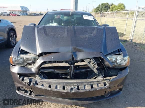 2014 Dodge Charger SXT Plus with VIN 2C3CDXHG6EH162511, listed as a IAAI auction lot 42978057 with 100,001 mi miles and . Bid and sale history available at DreamBid. Image 13.