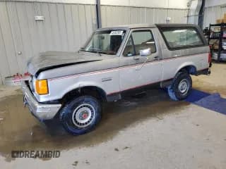 ✅ 1987 Ford Bronco • VIN: 1FMDU15Y1HLA18796 • Lot: 46362585. Listed on Copart with 44,356 mi. Free auction sales archive from the USA and detailed vehicle history report at DreamBid. Image 1.