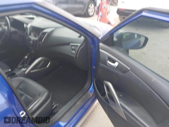 ✅ 2013 Hyundai Veloster Turbo • VIN: KMHTC6AE9DU181238 • Lot: 43525329. Listed on IAAI with 121,343 mi. Free auction sales archive from the USA and detailed vehicle history report at DreamBid. Image 5.