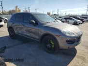 ✅ 2012 Porsche Cayenne S Hybrid • VIN: WP1AE2A29CLA90588 • Lot: 84244395. Listed on Copart with 103,610 mi. Free auction sales archive from the USA and detailed vehicle history report at DreamBid. Image 4.