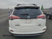 ✅ 2018 Toyota RAV4 Hybrid SE • VIN: JTMJJREV3JD245105 • Lot: 94752565. Listed on Copart with 43,597 mi. Free auction sales archive from the USA and detailed vehicle history report at DreamBid. Image 6.