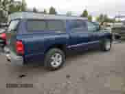 2005 Dodge Dakota SLT z VIN 1D7HE48K25S298652, wystawiony jako Copart lot #76132854 z przebiegiem 149 780 mil mil oraz Czysty tytuł • Clean title. Historia ofert i sprzedaży dostępna na DreamBid. Obrazek 3.