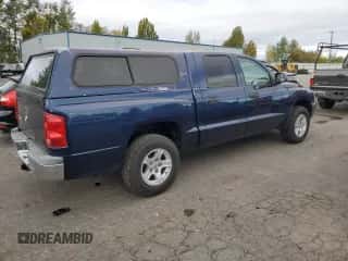 2005 Dodge Dakota SLT z VIN 1D7HE48K25S298652, wystawiony jako Copart lot #76132854 z przebiegiem 149 780 mil mil oraz Czysty tytuł • Clean title. Historia ofert i sprzedaży dostępna na DreamBid. Obrazek 3.