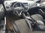 ✅ 2014 Hyundai Veloster • VIN: KMHTC6AD4EU216647 • Lot: 43772655. Wystawiony na Copart z przebiegiem 157 288 mil. Bezpłatny archiwum sprzedaży aukcyjnych z USA i szczegółowy raport historii pojazdu na DreamBid. Zdjęcie 8.