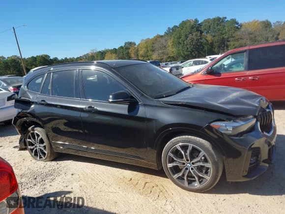 ✅ 2021 BMW X1 xDrive28i • VIN: WBXJG9C0XM5U28881 • Lot: 43518155. Listed on IAAI with 27,307 mi. Free auction sales archive from the USA and detailed vehicle history report at DreamBid. Image 13.