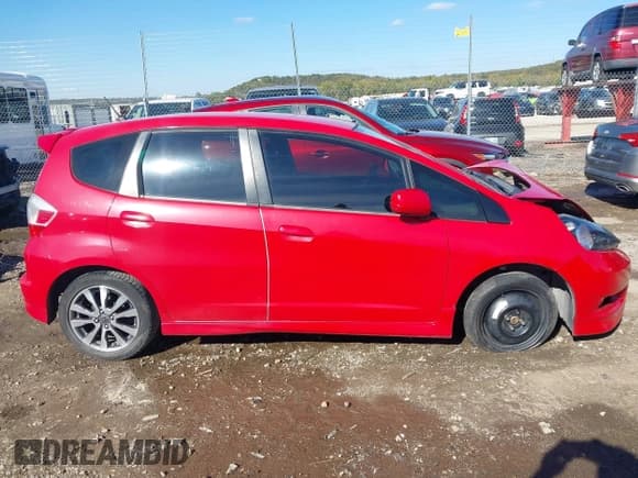 ✅ 2013 Honda Fit Sport • VIN: JHMGE8H57DC028265 • Lot: 43541415. Listed on IAAI with 129,252 mi. Free auction sales archive from the USA and detailed vehicle history report at DreamBid. Image 13.