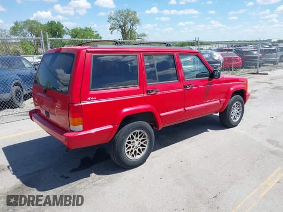✅ 1997 Jeep Cherokee Country • VIN: 1J4FJ78SXVL568925 • Lot: 42254459. Listed on IAAI with Not provided. Free auction sales archive from the USA and detailed vehicle history report at DreamBid. Image 4.