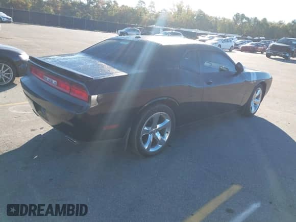 2012 Dodge Challenger R/T Plus with VIN 2C3CDYBT9CH275359, listed as a IAAI auction lot 43595746 with 182,928 mi miles and . Bid and sale history available at DreamBid. Image 4.