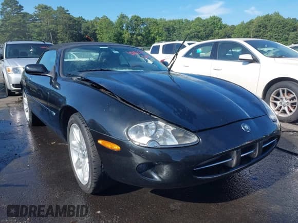✅ 2000 Jaguar XK • VIN: SAJJA42C8YNA09810 • Lot: 42855585. Listed on IAAI with Not provided. Free auction sales archive from the USA and detailed vehicle history report at DreamBid. Image 1.