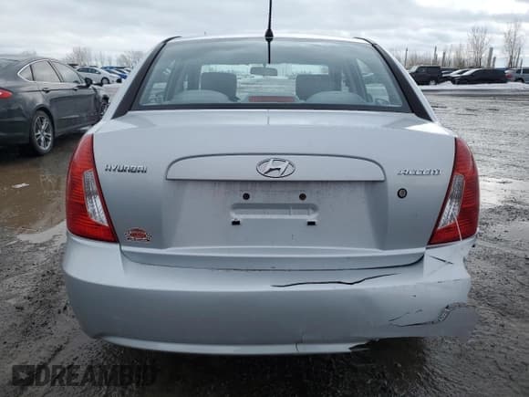 ✅ 2010 Hyundai Accent GL • VIN: KMHCN4BC0AU401826 • Лот: 45659195. Опубликован ранее на Copart с пробегом 168 392 миль. Бесплатный доступ к архиву аукционных продаж из США и подробный отчёт об истории автомобиля на DreamBid. Изображение 6.