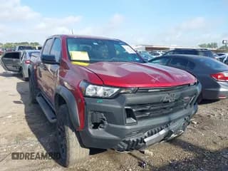 ✅ 2023 Chevrolet Colorado 4WD Trail Boss • VIN: 1GCPTEEK7P1251485 • Лот: 42440014. Опубликован ранее на IAAI с пробегом 32 402 миль. Бесплатный доступ к архиву аукционных продаж из США и подробный отчёт об истории автомобиля на DreamBid. Изображение 1.