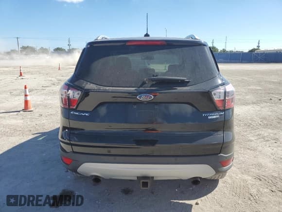 ✅ 2017 Ford Escape Titanium • VIN: 1FMCU9J91HUE85901 • Lot: 93261735. Listed on Copart with Not provided. Free auction sales archive from the USA and detailed vehicle history report at DreamBid. Image 6.