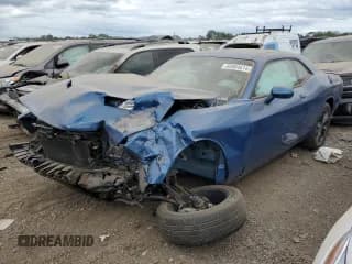 ✅ 2021 Dodge Challenger SXT • VIN: 2C3CDZGG0MH676379 • Lot: 65964614. Wystawiony na Copart z przebiegiem Nie podano. Bezpłatny archiwum sprzedaży aukcyjnych z USA i szczegółowy raport historii pojazdu na DreamBid. Zdjęcie 1.