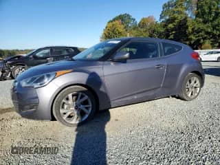 2016 Hyundai Veloster z VIN KMHTC6ADXGU271316, wystawiony jako Copart lot #87432775 z przebiegiem 160 132 mil mil oraz Czysty tytuł • Clean title. Historia ofert i sprzedaży dostępna na DreamBid. Obrazek 1.