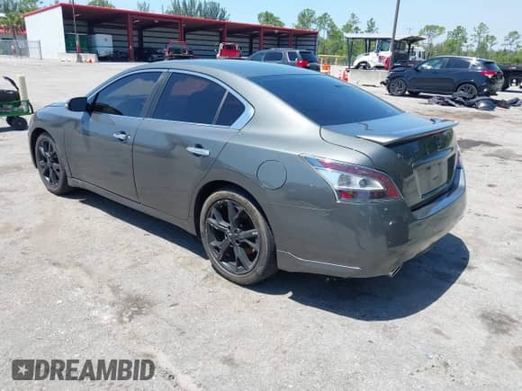 2012 Nissan Maxima S z VIN 1N4AA5AP2CC864082, wystawiony jako IAAI lot #42295921 z przebiegiem 72 583 mil mil oraz . Historia ofert i sprzedaży dostępna na DreamBid. Obrazek 3.