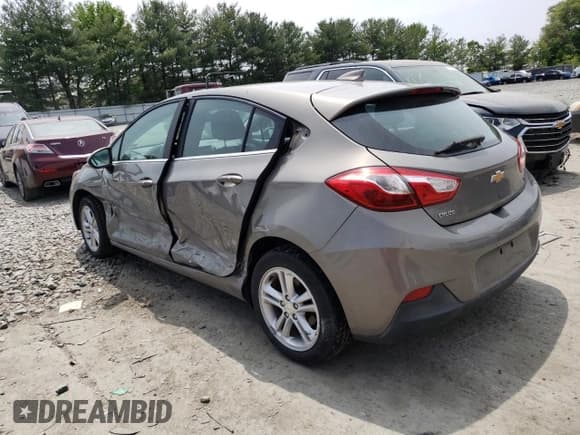 ✅ 2017 Chevrolet Cruze LT • VIN: 3G1BE6SM1HS534313 • Lot: 52442523. Listed on Copart with 62,258 mi. Free auction sales archive from the USA and detailed vehicle history report at DreamBid. Image 2.