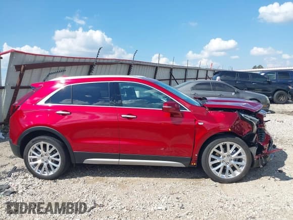 ✅ 2022 Cadillac XT4 AWD Premium Luxury • VIN: 1GYFZDR49NF142231 • Lot: 43358654. Wystawiony na IAAI z przebiegiem 23 965 mil. Bezpłatny archiwum sprzedaży aukcyjnych z USA i szczegółowy raport historii pojazdu na DreamBid. Zdjęcie 13.