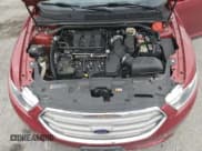 ✅ 2018 Ford Taurus SEL • VIN: 1FAHP2E84JG138017 • Lot: 70814385. Listed on Copart with 103,440 mi. Free auction sales archive from the USA and detailed vehicle history report at DreamBid. Image 11.