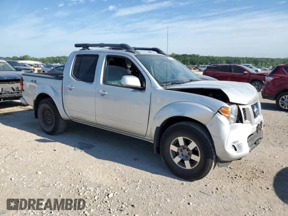 ✅ 2012 Nissan Frontier Pro-4X • VIN: 1N6AD0EV3CC405900 • Lot: 63515115. Listed on Copart with 61,015 mi. Free auction sales archive from the USA and detailed vehicle history report at DreamBid. Image 4.