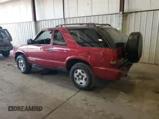 2003 Chevrolet Blazer LS z VIN 1GNCT18X13K165163, wystawiony jako Copart lot #78693034 z przebiegiem 159 770 mil mil oraz Szkoda całkowita • Salvage title. Historia ofert i sprzedaży dostępna na DreamBid. Obrazek 2.