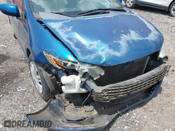 ✅ 2011 Honda Insight LX • VIN: JHMZE2H5XBS010979 • Lot: 42238003. Listed on IAAI with 171,500 mi. Free auction sales archive from the USA and detailed vehicle history report at DreamBid. Image 6.