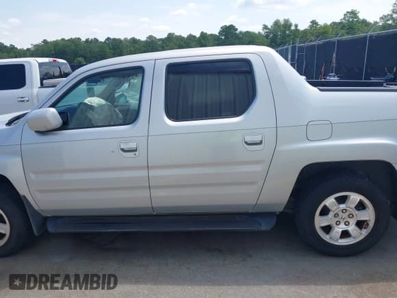 ✅ 2009 Honda Ridgeline RTS • VIN: 2HJYK16489H502952 • Lot: 42801192. Wystawiony na IAAI z przebiegiem 290 892 mil. Bezpłatny archiwum sprzedaży aukcyjnych z USA i szczegółowy raport historii pojazdu na DreamBid. Zdjęcie 14.