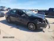 ✅ 2017 Ford Focus SEL • VIN: 1FADP3H26HL221249 • Lot: 87484265. Wystawiony na Copart z przebiegiem 140 684 mil. Bezpłatny archiwum sprzedaży aukcyjnych z USA i szczegółowy raport historii pojazdu na DreamBid. Zdjęcie 4.