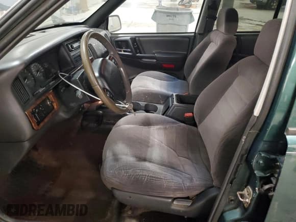 ✅ 1996 Jeep Grand Cherokee Laredo • VIN: 1J4GZ58S9TC198257 • Lot: 93327175. Listed on Copart with 169,183 mi. Free auction sales archive from the USA and detailed vehicle history report at DreamBid. Image 7.