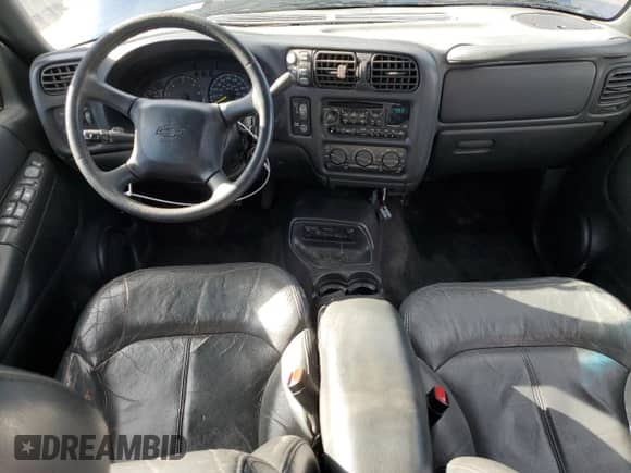 2000 Chevrolet Blazer LT z VIN 1GNDT13W8Y2390660, wystawiony jako Copart lot #77702494 z przebiegiem 225 212 mil mil oraz Szkoda całkowita • Salvage title. Historia ofert i sprzedaży dostępna na DreamBid. Obrazek 8.