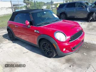 ✅ 2014 MINI Convertible S • VIN: WMWZP3C50ET298497 • Lot: 42345812. Listed on IAAI with 119,921 mi. Free auction sales archive from the USA and detailed vehicle history report at DreamBid. Image 1.
