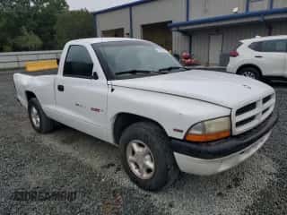 1997 Dodge Dakota с VIN 1B7FL26P8VS185234, выставлен на аукционе Copart как лот 71407854 с пробегом 220 549 миль миль и Списание • Salvage title. История ставок и продаж доступна на DreamBid. Изображение 4.