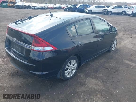 ✅ 2012 Honda Insight EX • VIN: JHMZE2H72CS000160 • Lot: 41909694. Listed on IAAI with 106,312 mi. Free auction sales archive from the USA and detailed vehicle history report at DreamBid. Image 4.
