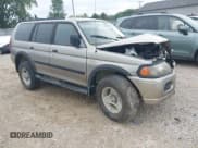 ✅ 2000 Mitsubishi Montero Sport LS • VIN: JA4LS31H8YP805111 • Лот: 42490750. Опубликован ранее на IAAI с пробегом 250 886 миль. Бесплатный доступ к архиву аукционных продаж из США и подробный отчёт об истории автомобиля на DreamBid. Изображение 1.