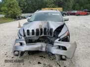 ✅ 2018 Jeep Cherokee Latitude • VIN: 1C4PJLCB5JD574405 • Lot: 84430205. Listed on Copart with 191,681 mi. Free auction sales archive from the USA and detailed vehicle history report at DreamBid. Image 14.